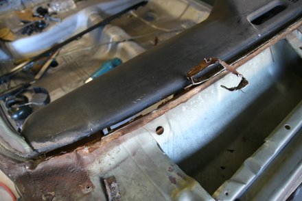 Peeling away the old metal. No drilling. 67 GTO windshield repair panel.