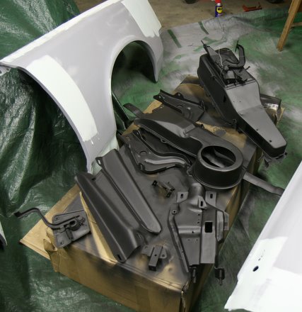 Pile o' parts primed with Kirker epoxy