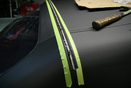 Wire-on for convertible top rear bow
