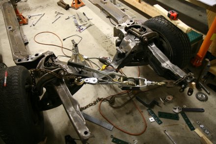 Pulling 67 GTO frame horn into alignment with come-along