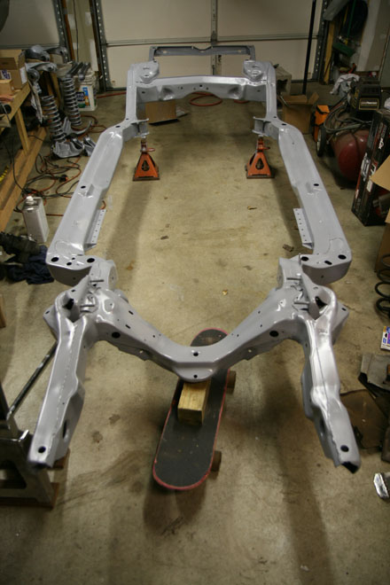 GTO convertible frame swathed in epoxy primer